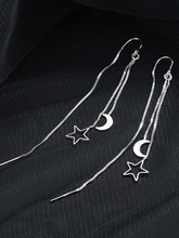 Quastenohrring mit Stern und Mond Dekor